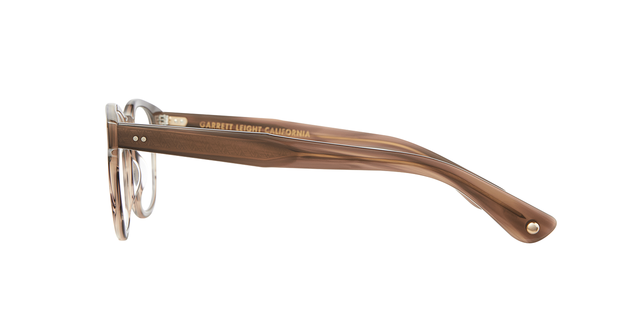 the cult-favorite Ace Sun transformed into an optical. Ace II reflects the standard way in which we design and create premium eyewear. We’re not reinventing the wheel here – just putting some rims on ‘em. In Sequoia Tortoise, an ashy light brown tortoise shell like pattern. This image shows the complete sideview of the frame.