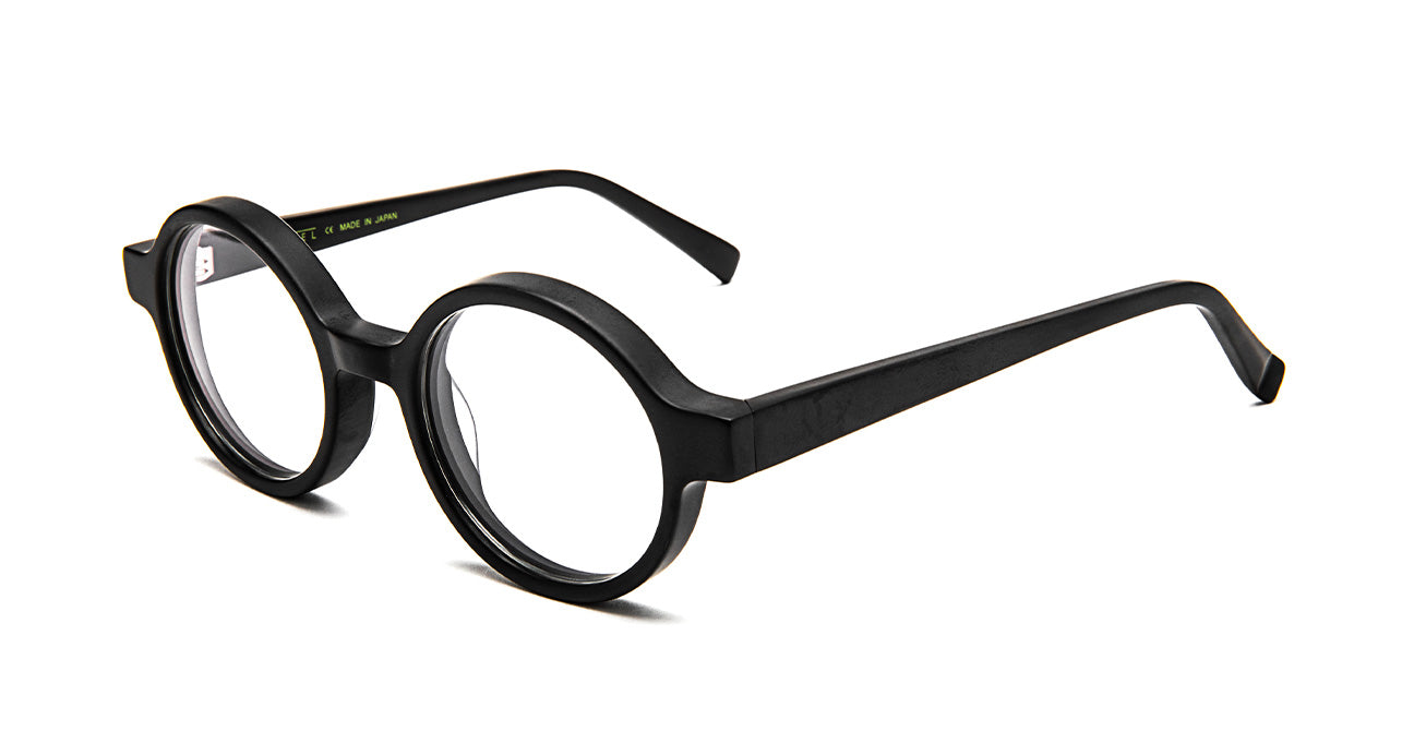 Side view of bevel schulze black round eyeglasses on a white background