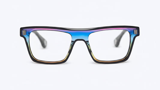 A pair of square eyeglasses with a thick black front frame and a vibrant iridescent blue, purple, and gold gradient acetate bridge and temples, shown against a plain white background.
