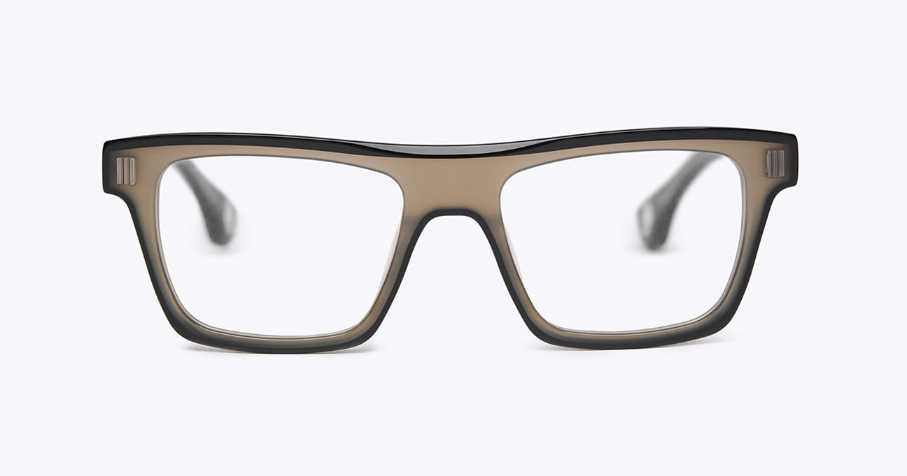 A pair of square-frame eyeglasses with a translucent taupe-brown acetate frame and clear lenses, shown against a plain light gray background.
