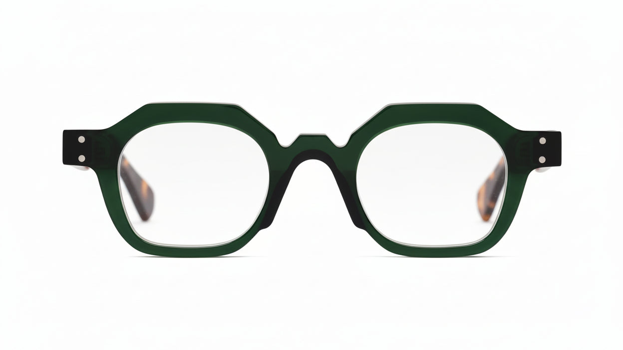 Green sunglasses with dark lenses on a white background