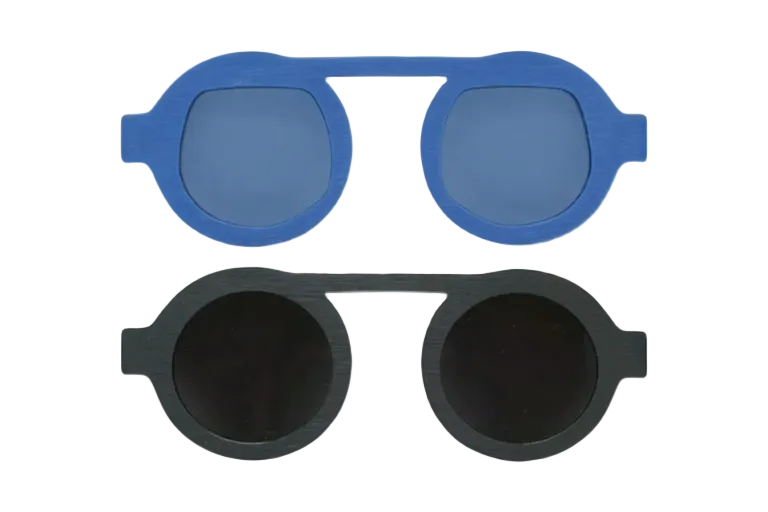 Blue and black sunglass clips on a white background