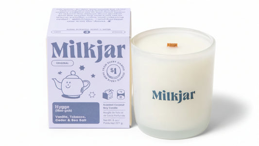 Milkjar candle and packaging on a white background