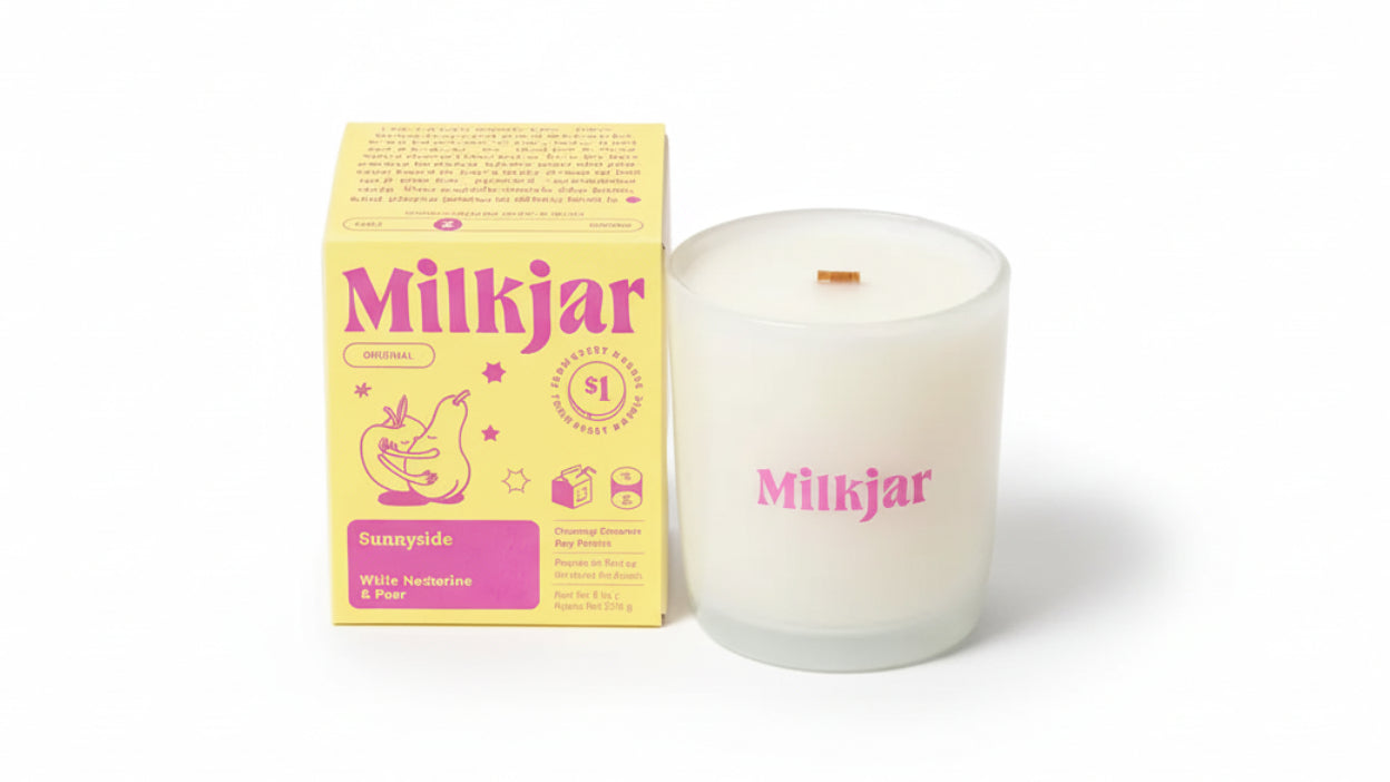 Milkjar sunnyside candle and packaging on a white background