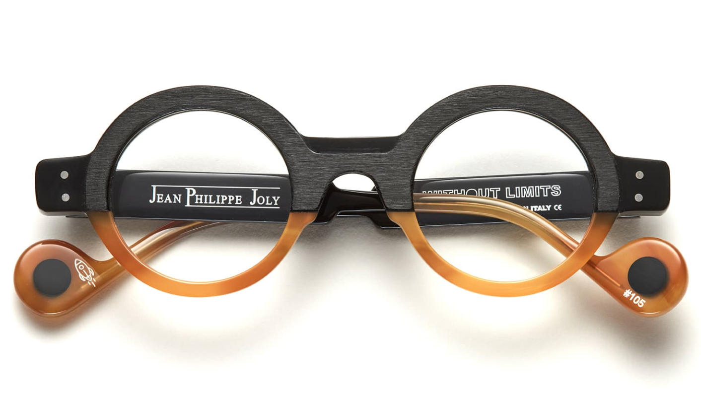 Eyeglasses with black and brown front and arms on a white background