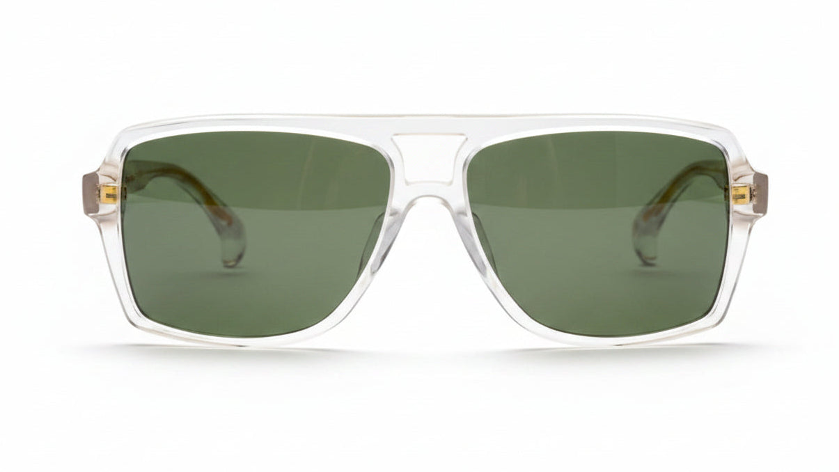Clear sunglasses with gold accents on a white background. Green polarized lenses.
