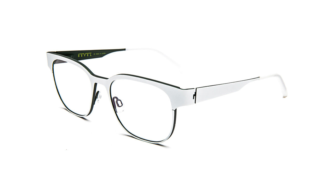 White bevel eyeglasses with black accents on a white background