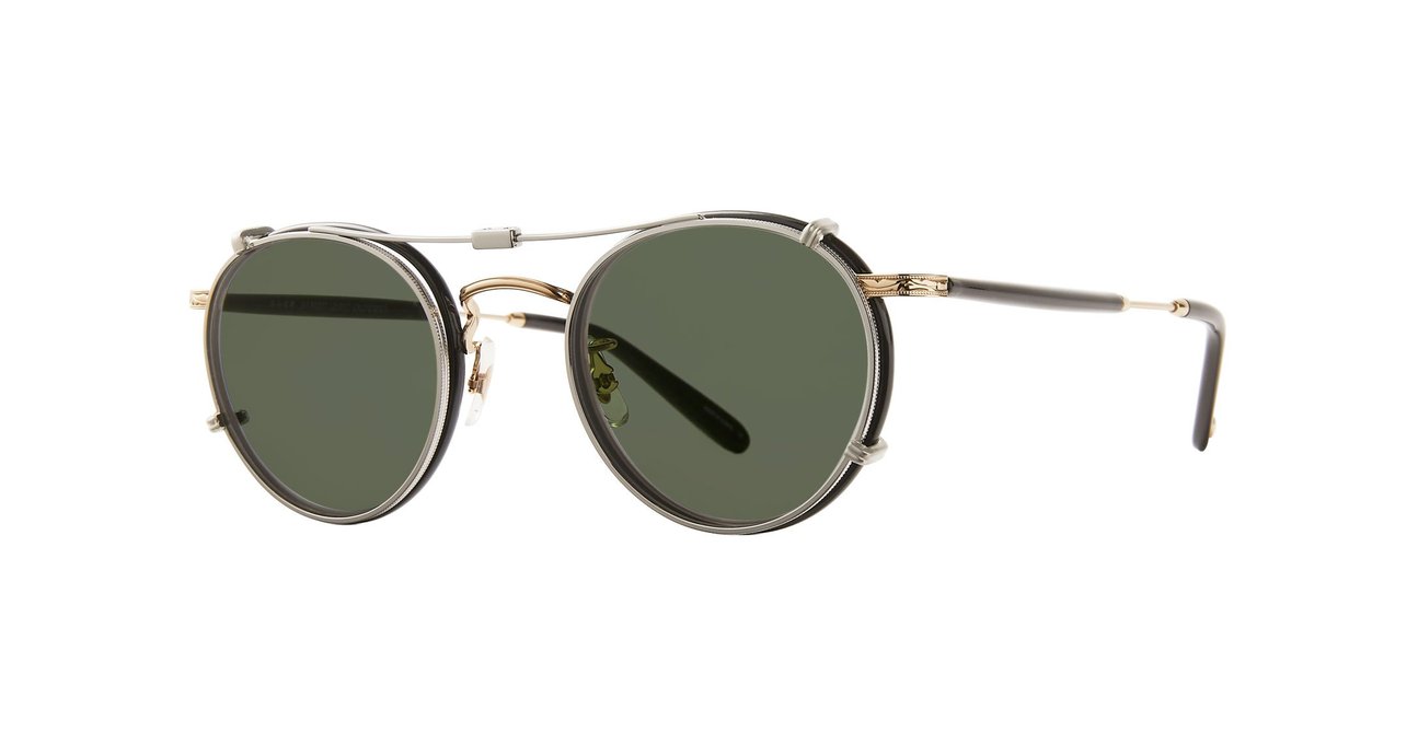 Side view of a silver Garrett Leight stainless steel folding sun clip with green tinted lenses, designed to attach to Wilson eyeglasses, displayed against a plain background.