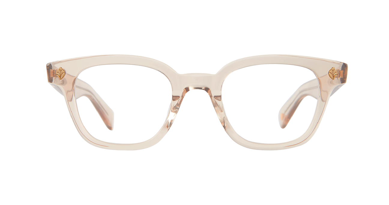 With rich materials and a bold silhouette, the Naples Bio Beige eyeglass frame infuses a modern design with vintage sensibility. Palm leaf plaques embellish the exaggerated end pieces for a look that's equal parts minimal and striking. Select colorways are crafted from the new bio-based acetate. Hand Finished in LA. 