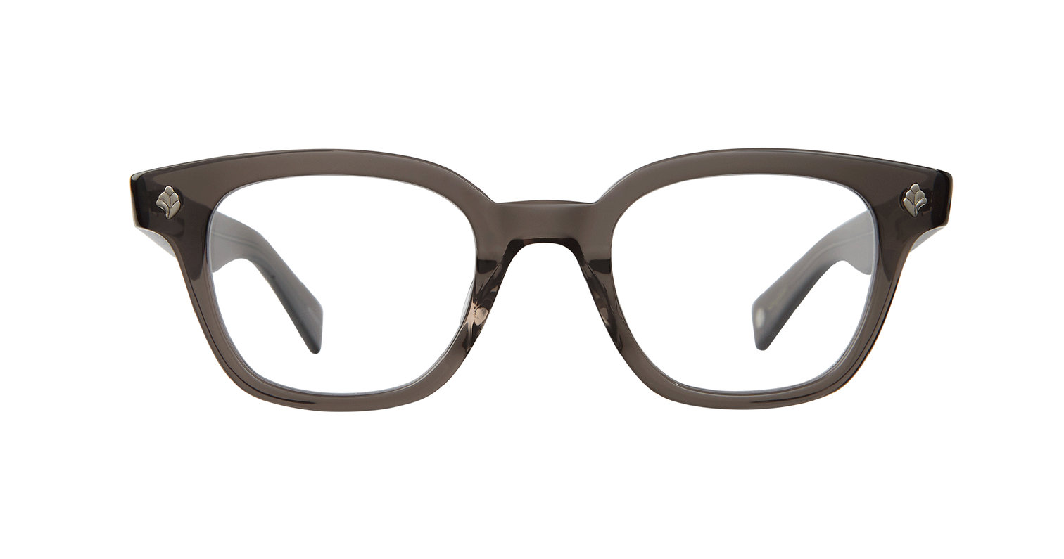 With rich materials and a bold silhouette, the Naples Bio Charcoal eyeglass frame infuses a modern design with vintage sensibility. Palm leaf plaques embellish the exaggerated end pieces for a look that's equal parts minimal and striking. Select colorways are crafted from the new bio-based acetate. Hand Finished in LA. 