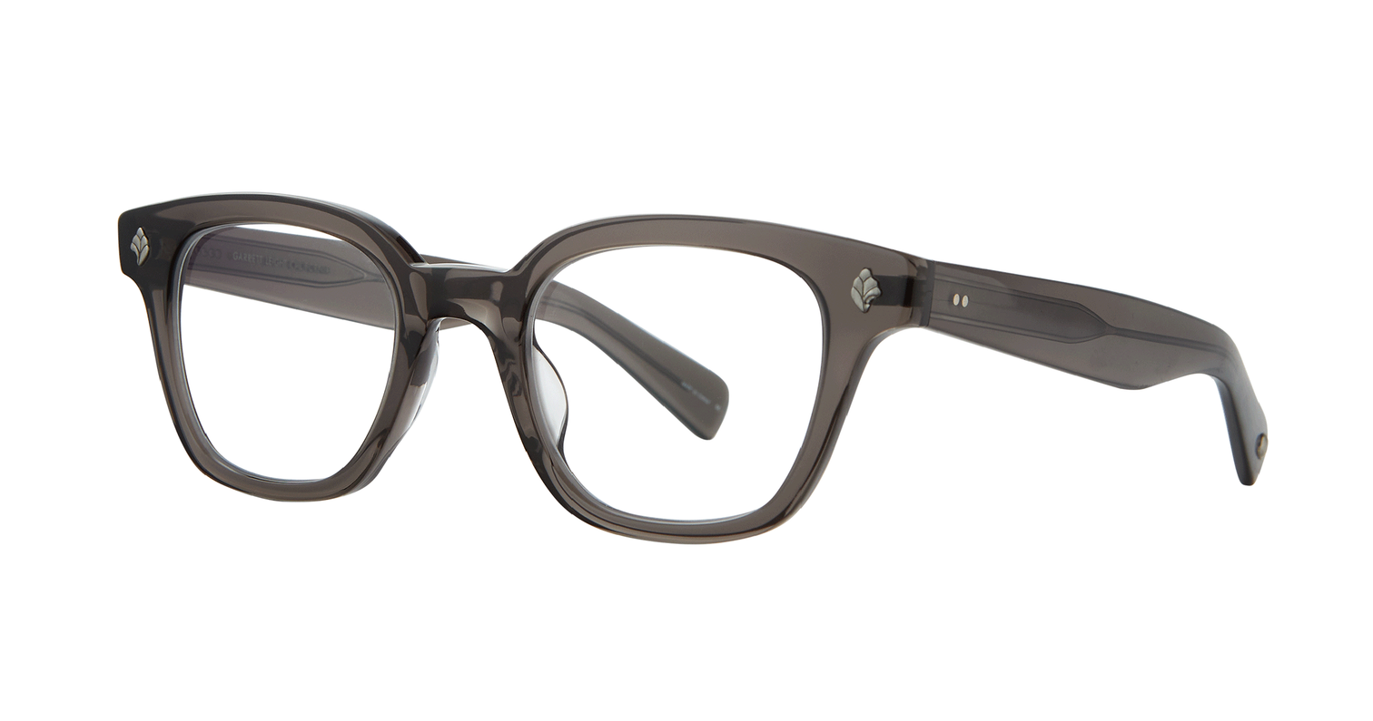 With rich materials and a bold silhouette, the Naples Bio Charcoal eyeglass frame infuses a modern design with vintage sensibility. Palm leaf plaques embellish the exaggerated end pieces for a look that's equal parts minimal and striking. Select colorways are crafted from the new bio-based acetate. Hand Finished in LA. 